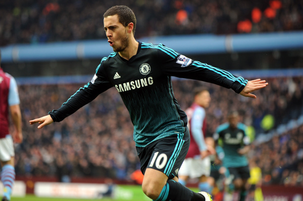 Chelsea's Eden Hazard celebrates after scoring against Villa during the English Premier League soccer match between Aston Villa and Chelsea at Villa Park, Birmingham, England, Saturday, Feb 7, 2015. (AP Photo/Rui Vieira)