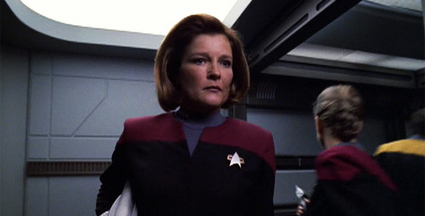 Captain Janeway with a gun