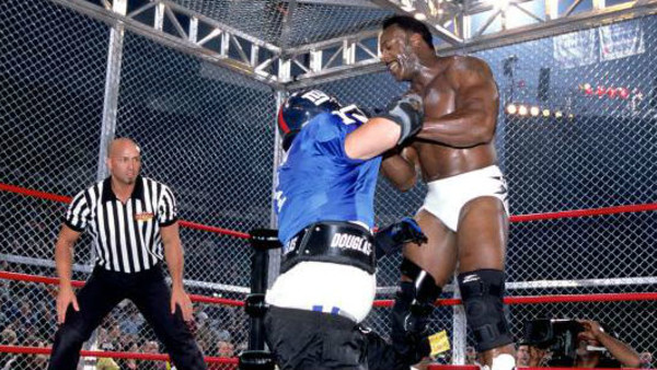 Booker T Vince Russo Cage