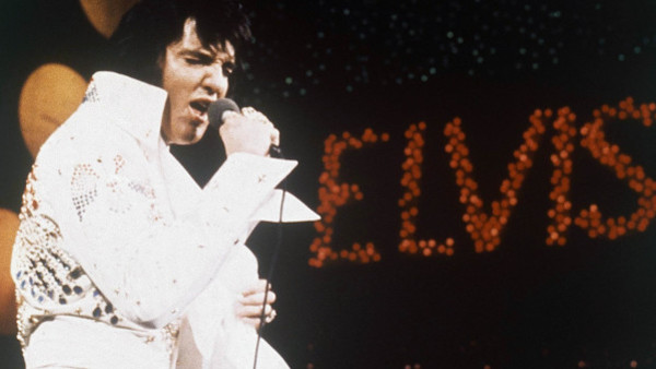 FILE - This 1972 file photo shows Elvis Presley, the King of Rock 'n' Roll, during a performance. Digital Domain Media Group announced Wednesday, June 6, 2012 that it is creating a Presley hologram for shows, film, TV and other projects worldwide,