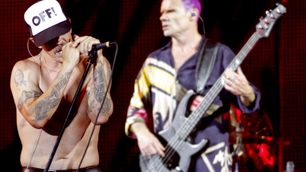 The Red Hot Chili Peppers perform at the Austin City Limits Music Festival, Sunday, Oct. 14, 2012, in Austin, Texas.(Photo by Jack Plunkett/Invision/AP)