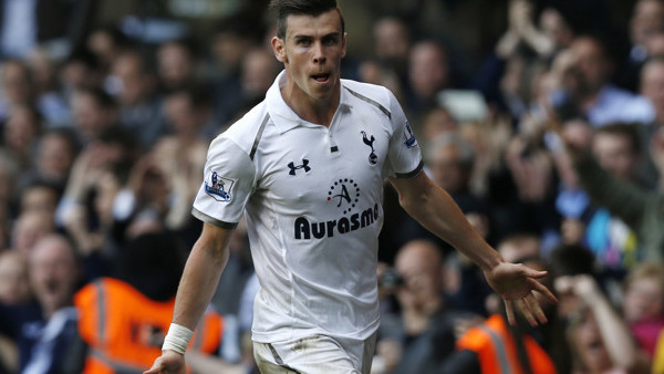 Tottenham Hotspur's Gareth Bale celebrates his goal against Sunderland during their English Premier League soccer match at White Hart Lane, London, Sunday, May 19, 2013. (AP Photo/Sang Tan)