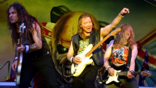 Iron Maiden (from left) Steve Harris, Dave Murray, Janick Gers, performing on stage at the Download Festival 2003 at the Donington Park International Conference & Exhibition Centre in Leicestershire.