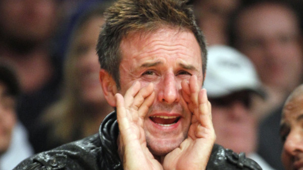Actor David Arquette yells at a referee during an NBA basketball game between the San Antonio Spurs and Los Angeles Lakers Friday, Nov. 1, 2013, in Los Angeles. (AP Photo/Alex Gallardo)
