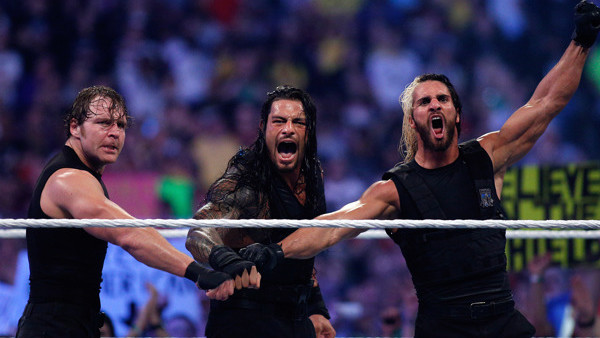 The Shield reacts after their win during Wrestlemania XXX at the Mercedes-Benz Super Dome in New Orleans on Sunday, April 6, 2014. (Jonathan Bachman/AP Images for WWE)