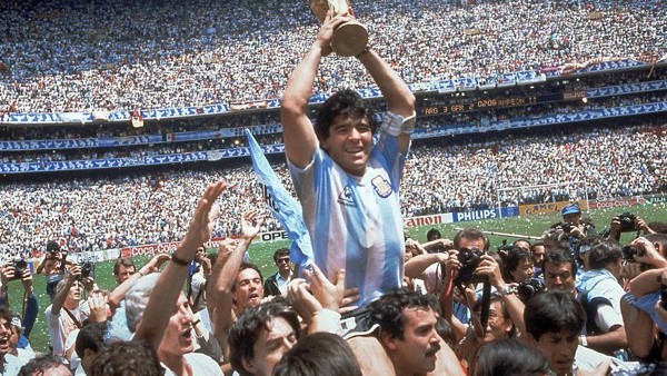 FILE - This is a June 29, 1986 file photo of Diego Maradona of Argentina celebrates with the cup at the end of the World Cup soccer final in the Atzeca Stadium, in Mexico City, Mexico. Argentina defeated West Germany 3-2 to take the trophy. With one week 