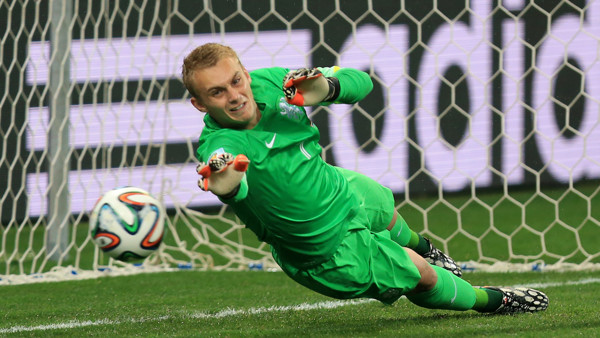 Netherlands goalkeeper Jasper Cillessen dives during the penalty shootout