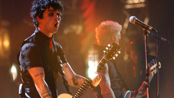 Green Day perform live on stage.