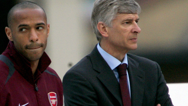 Arsenal's Thierry Henry, left, stands with his manager Arsene Wenger during presentations after beating Wigan Athletic in their final English Premier League soccer match at Arsenal's Highbury stadium against Wigan Athletic, Sunday May 7, 2006. Highbury ho