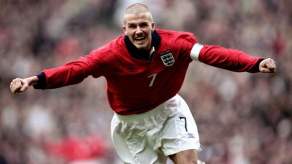 England's David Beckham celebrates scoring the second goal against Finland  