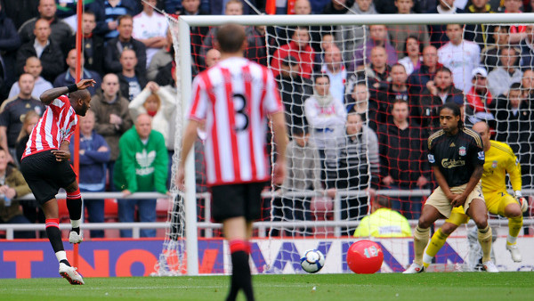 Sunderland's Darren Bent (left) scores his side's first goal of the game