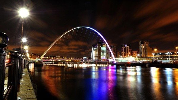 STANDALONE PHOTO: A view of the Gateshead Millennium Bridge lit up at night over the River Tyne in Newcastle last night.