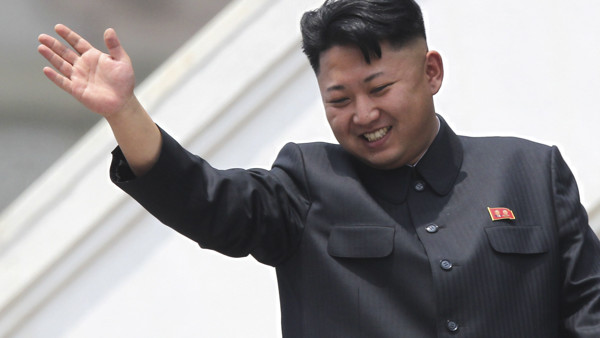 FILE - In this July 27, 2013 photo, North Korean leader Kim Jong Un waves to war veterans during a mass military parade celebrating the 60th anniversary of the Korean War armistice in Pyongyang, North Korea. From