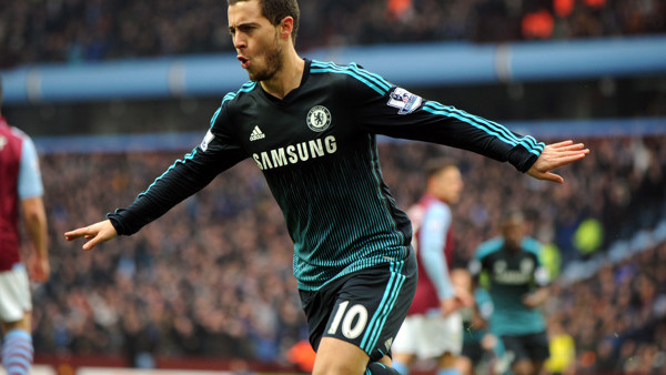 Chelsea's Eden Hazard celebrates after scoring against Villa during the English Premier League soccer match between Aston Villa and Chelsea at Villa Park, Birmingham, England, Saturday, Feb 7, 2015. (AP Photo/Rui Vieira)