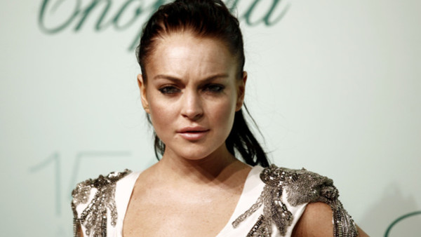 ** CORRECTS FIRST NAME TO LINDSAY **Lindsay Lohan arrives for the Chopard 150th anniversary party, during the 63rd international film festival, in Cannes, France, Monday, May 17, 2010. (AP Photo/Matt Sayles)