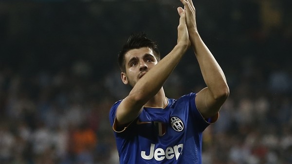 Juventus' Alvaro Morata applauds supporters at the end of the Champions League second leg semifinal soccer match between Real Madrid and Juventus, at the Santiago Bernabeu stadium in Madrid, Wednesday, May 13, 2015. The match ended in a 1-1 draw and J