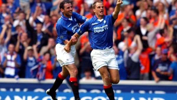 Rangers' Ronald De Boer celebrates scoring their opening goal with Kevin Muscat against Aberdeen