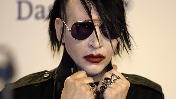 U.S. singer Marilyn Manson arrives for awarding ceremony of Germany's music award 'Echo' in Berlin, Thursday, March 22, 2012. (AP Photo/Markus Schreiber)