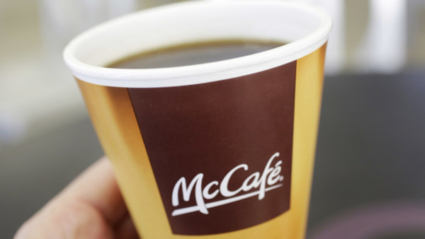 FILE - In this Feb. 14, 2013 file photo, coffee served in a foam cup is held for an illustration at a McDonald's restaurant in New York. The world's biggest hamburger chain says it will test selling a variety of packaged ground and whole-bean coffee at su