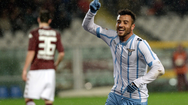 Lazio's Felipe Anderson celebrates after scoring during a Serie A soccer match between Torino and Lazio at the Olympic stadium, in Turin, Italy, Monday, March 16, 2015. (AP Photo/Massimo Pinca)