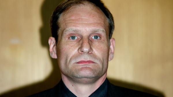 Armin Meiwes, who was convicted of killing and eating another man, waits for the verdict in his retrial at a regional court in Frankfurt, central Germany, Tuesday, May 9, 2006. Meiwes was convicted of murder and sentenced to life in prison Tuesday after h
