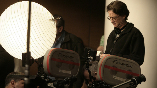 Director David Koepp prepares for the next scene on the set of the movie 