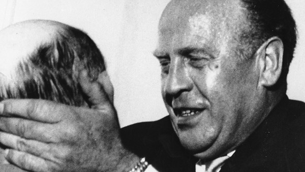 Oskar Schindler, a German who saved hundreds of Jews from the Nazi gas chambers during World War II, is seen greeting one of about 300 Israelis who welcomed him in Jerusalem, Israel on May 1, 1962. (AP Photo)