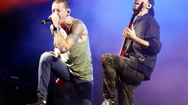 Chester Bennington, from left, and Mike Shinoda of the band Linkin Park perform in concert during their Carnivores Tour 2014 at the Susquehanna Bank Center on Friday, Aug. 15, 2014, in Camden, N.J. (Photo by Owen Sweeney/Invision/AP)