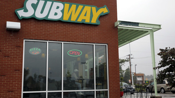 A Subway restaurant is shown Tuesday, July 7, 2015, in St. Louis. FBI agents and Indiana State Police raided the home of Subway restaurant spokesman Jared Fogle on Tuesday, removing electronics from the property and searching the house with a police dog. 