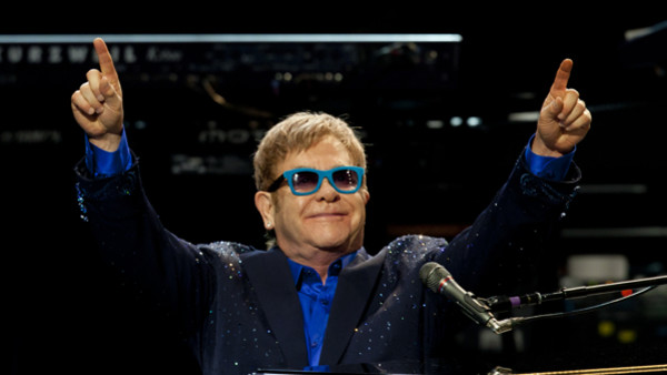 Sir Elton John and his band, during his performance at Royal Theatre in Madrid, Spain. Monday, July 20, 2015. (AP Photo/Abraham Caro Marin)