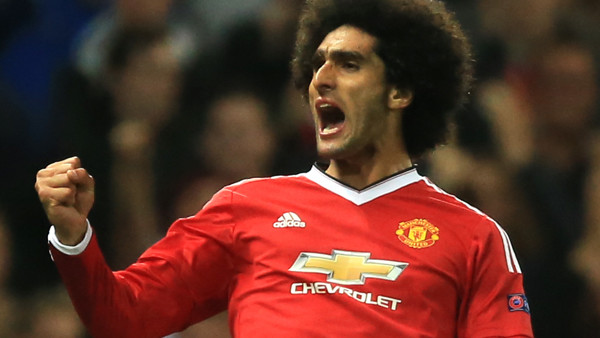 Manchester United's Marouane Fellaini celebrates scoring his side's third goal of the game against Club Brugge.