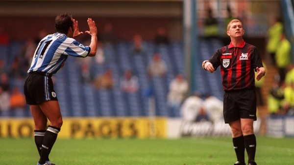 Paolo Di Canio of Sheffield Wednesday (left) gestures to referee Paul Durkin (right)