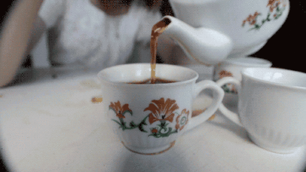 pouring dripping teapot