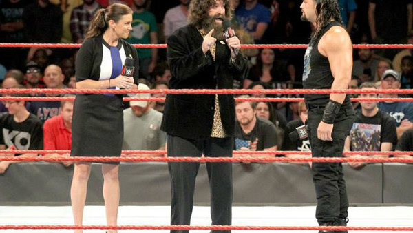 stephanie mcmahon mick foley roman reigns