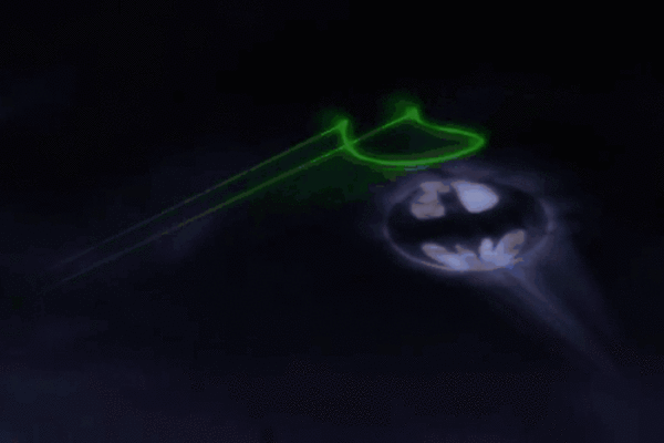 batman calls superman with bat signal gif