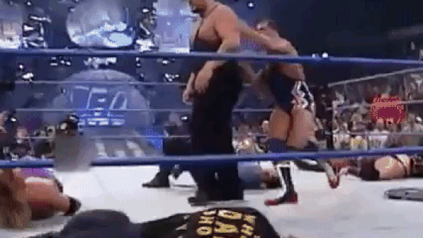 Undertaker moves the chair out of harm's way