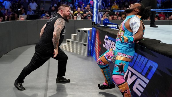 Kevin Owens Xavier Woods