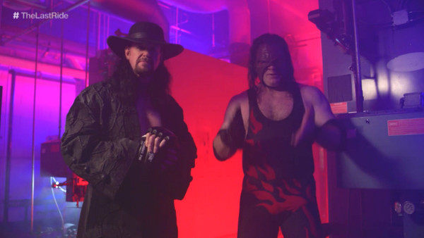 The Undertaker Kane Crotch Chop